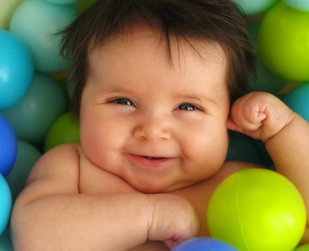 baby-lying-in-ballpit